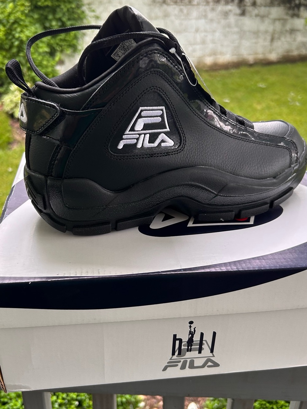 FILA Men's All-Black Leather Mid-Top Sneakers